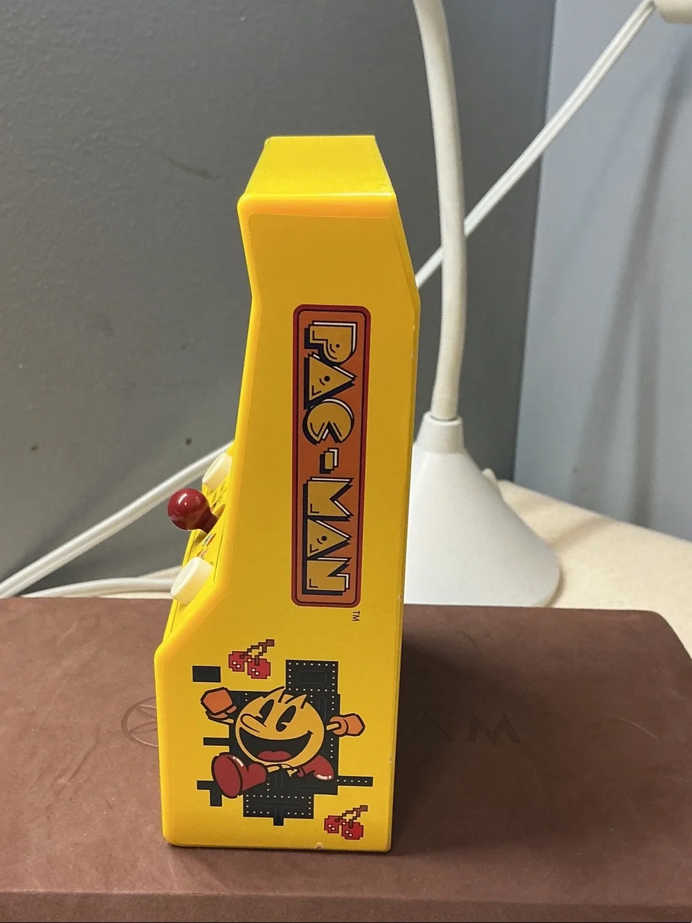 Pac-Man Portable Handheld Game Console in Yellow